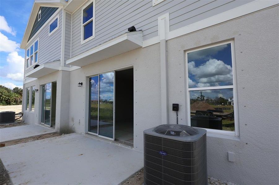 Exterior details and patio area of a home in , Parrish (Image 3).