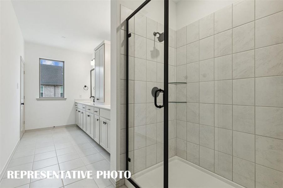 Your new owner's bath comes complete with an oversized, walk in shower.  REPRESENTATIVE PHOTO