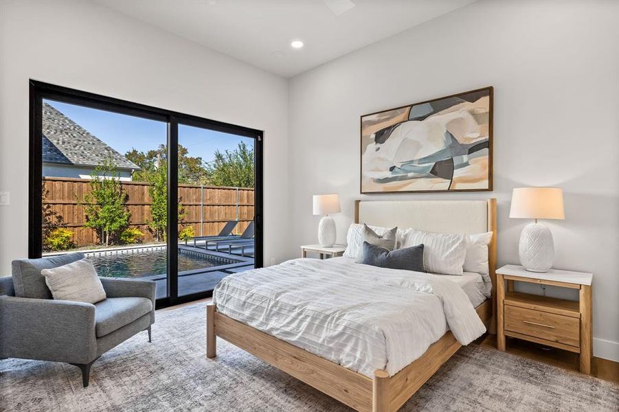 Bedroom featuring access to outside, wood finished floors, recessed lighting, and ceiling fan Bedroom featuring access to outside, wood finished floors, recessed lighting, and ceiling fan