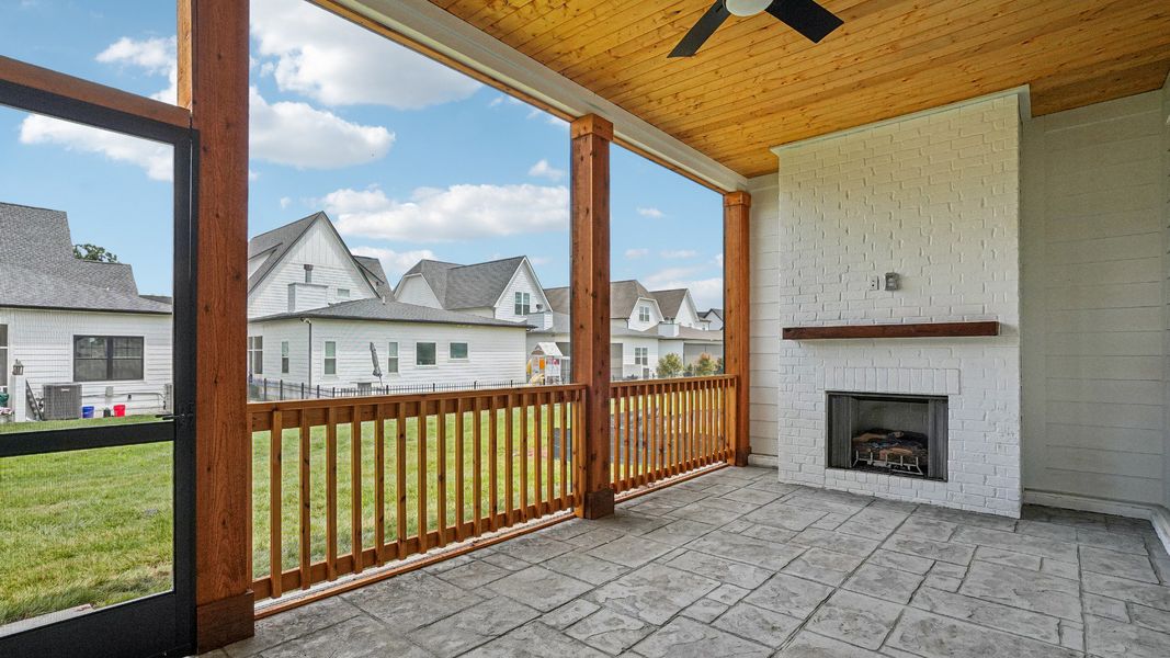Covered and Screened-in Outdoor Space with fireplace