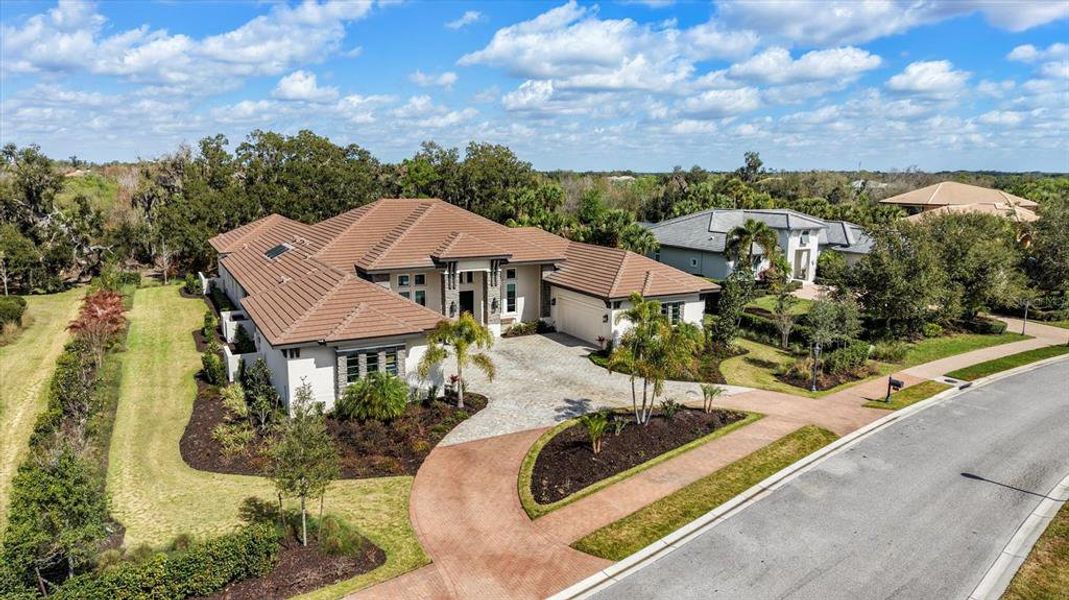 Front exterior of a new home in , Sarasota, FL, highlighting curb appeal (Image 2). Front exterior of a new home in , Sarasota, FL, highlighting curb appeal (Image 2).