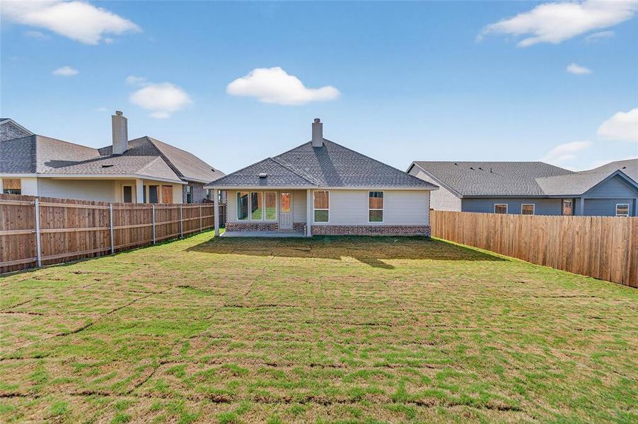 Exterior details and patio area of a home in Liberty Pointe, Gainesville (Image 26).