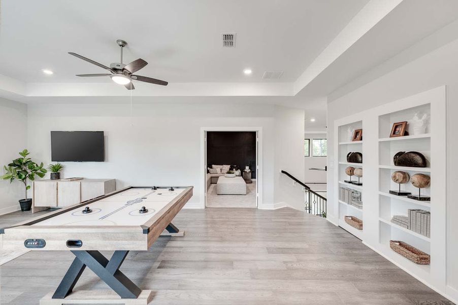 Representative furnished interior of a home built from the Verona by Tri Pointe Homes in Sienna 80′, Missouri City (Image 37).
