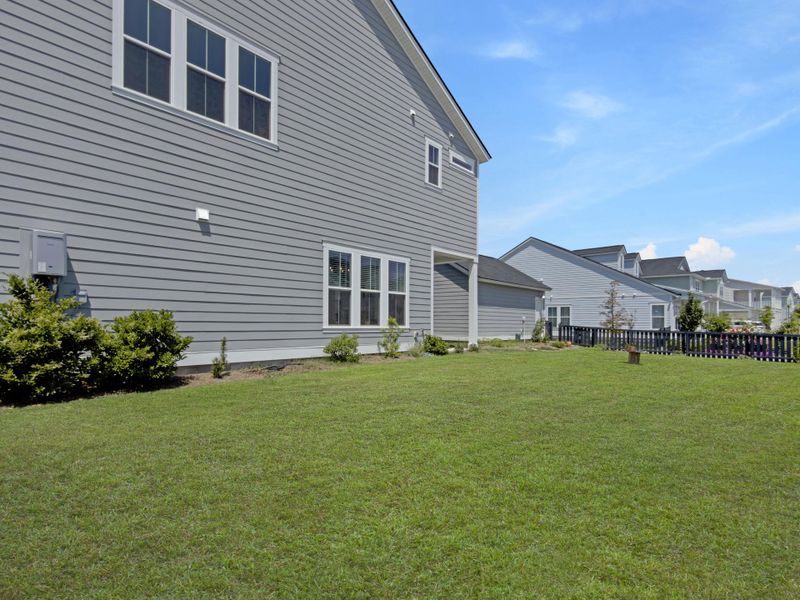 Exterior details and patio area of a home in Carnes Crossroads, Summerville (Image 27). Exterior details and patio area of a home in Carnes Crossroads, Summerville (Image 27).