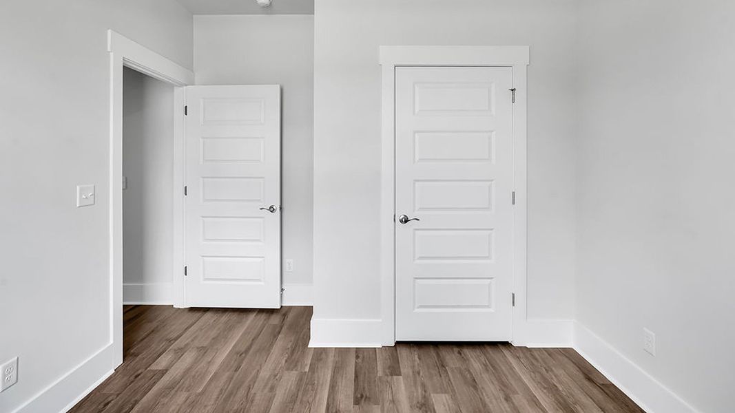 Spacious, unfurnished interior of a new home in The Haven at Indigo Preserve, Leland (Image 22).