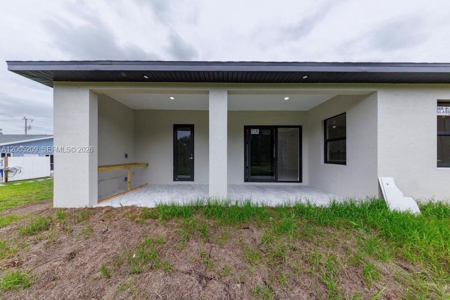 Exterior details and patio area of a home in , Lehigh Acres (Image 3).