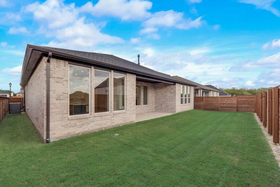 Exterior details and patio area of a home in Solterra Texas, Mesquite (Image 24).