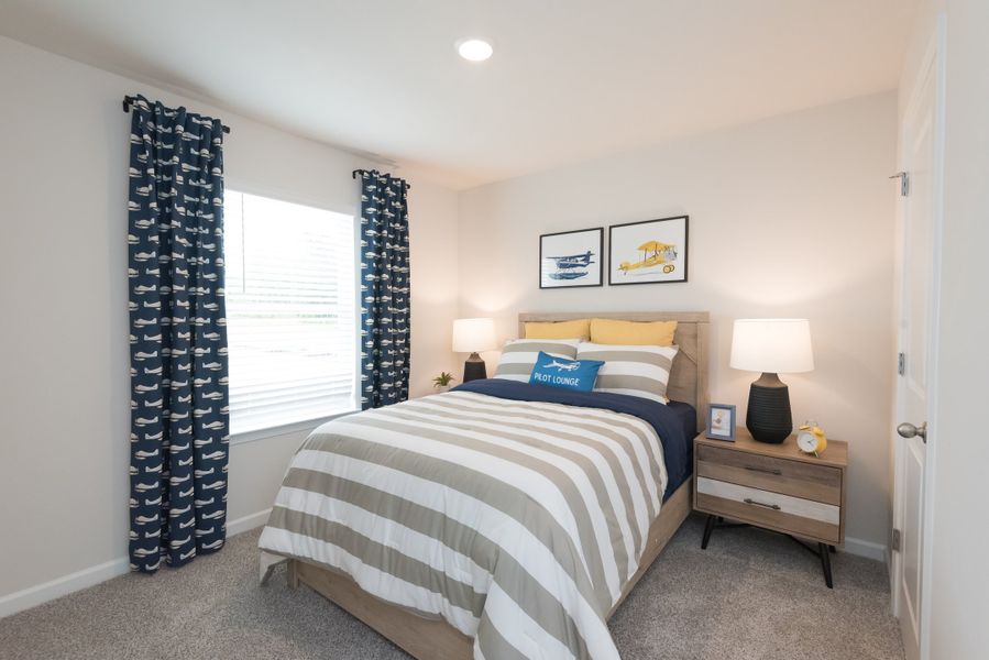 The Dallas floorplan features two secondary bedrooms.