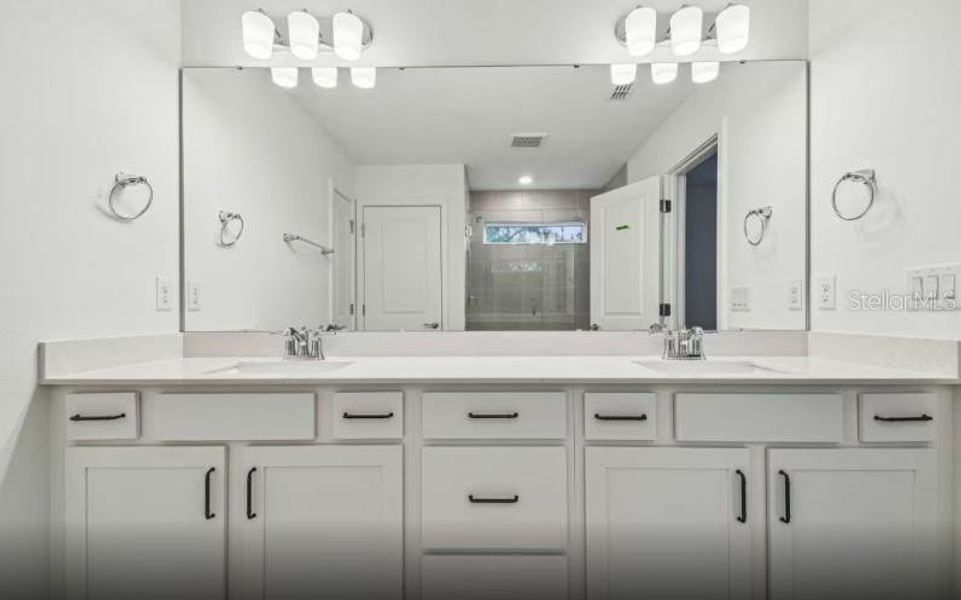 Furnished interior view inside a new home in Grandura, Sarasota (Image 6).