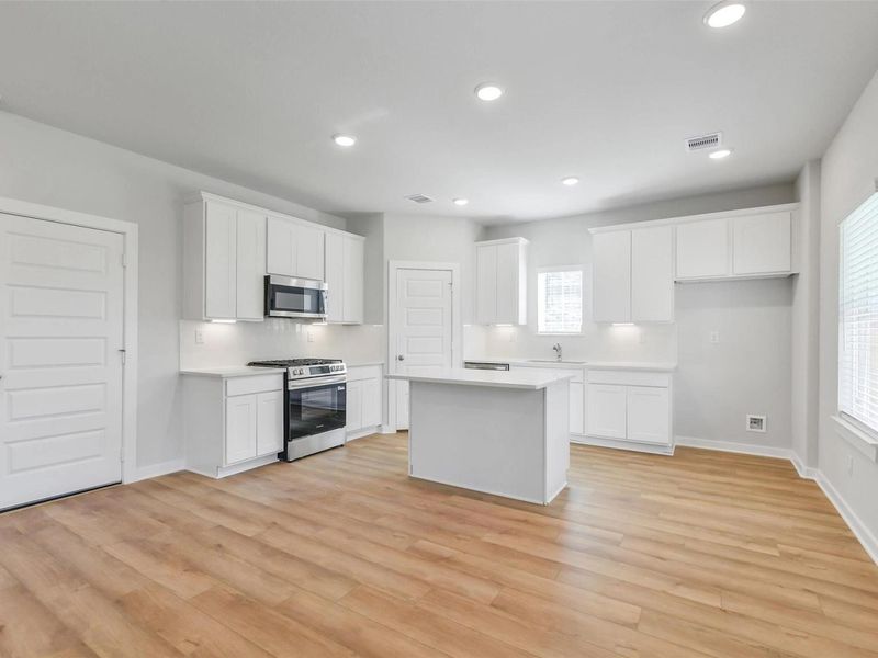 Furnished interior view inside a new home in Lakes at Black Oak, Magnolia (Image 7).
