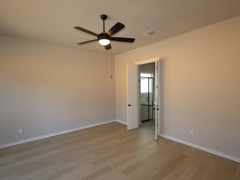 Spacious, unfurnished interior of a new home in Heritage, Dripping Springs (Image 14).