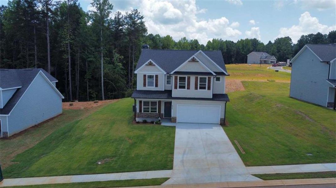 Front exterior of a new home in , Lula, GA, highlighting curb appeal (Image 1). Front exterior of a new home in , Lula, GA, highlighting curb appeal (Image 1).