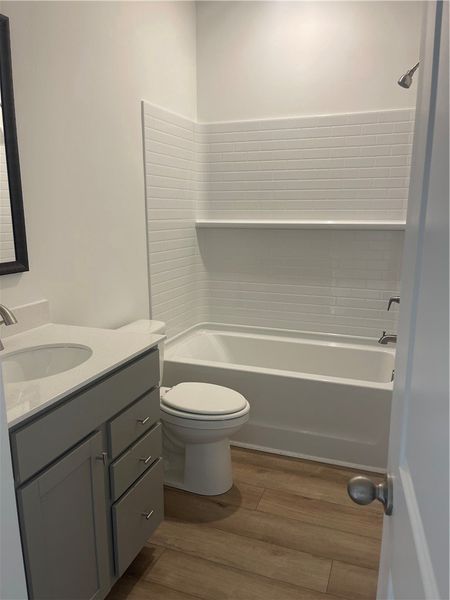 Furnished interior view inside a new home in Springwood Grove, Central (Image 5).