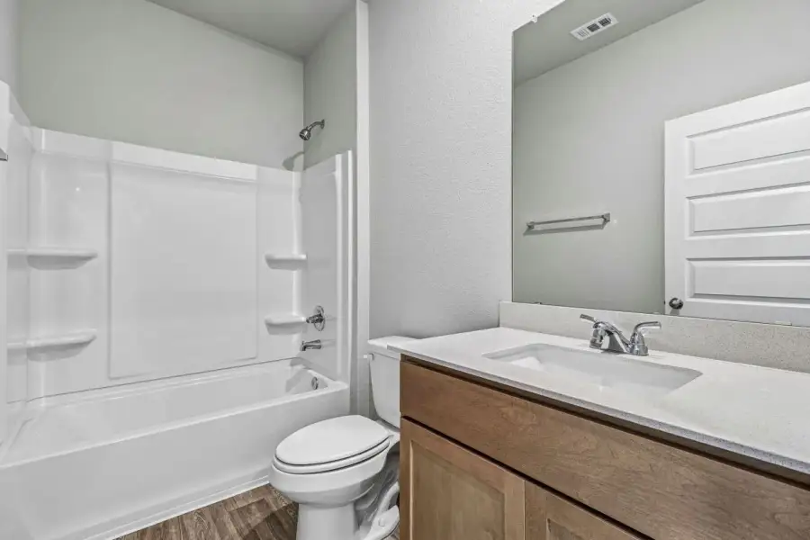 Furnished interior view inside a new home in Edgebrooke, Pflugerville (Image 12).