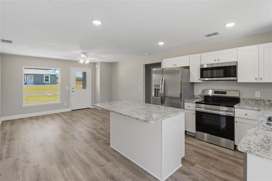 Furnished interior view inside a new home in , Avon Park (Image 9).