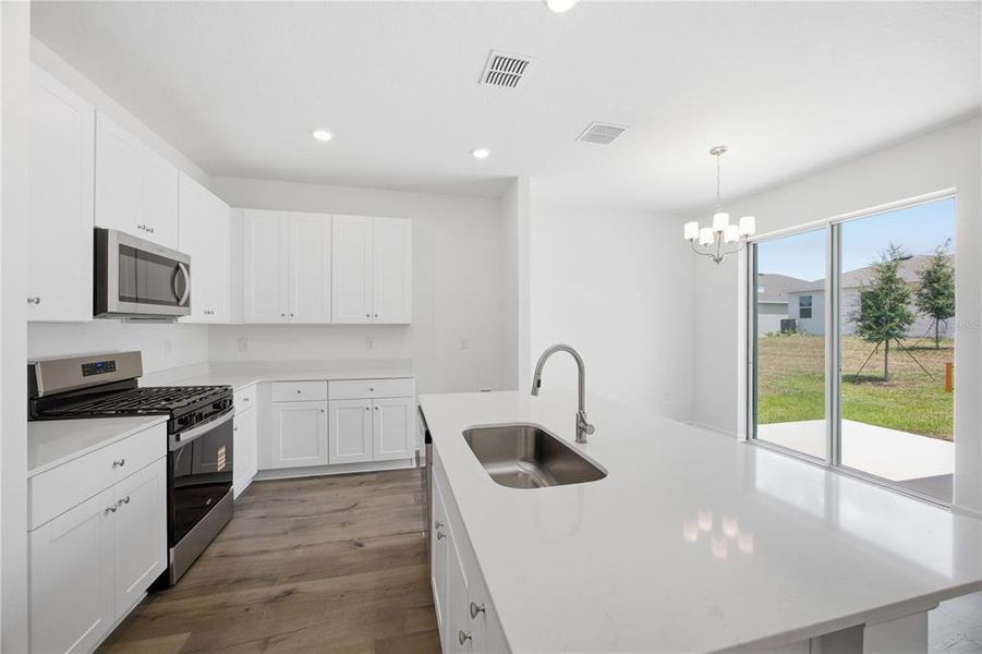 Furnished interior view inside a new home in , Okahumpka (Image 5).