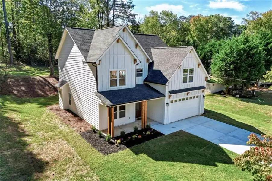 Front exterior of a new home in , Austell, GA, highlighting curb appeal (Image 24). Front exterior of a new home in , Austell, GA, highlighting curb appeal (Image 24).
