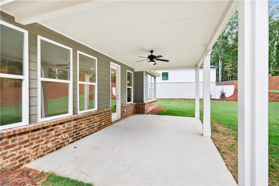 Exterior details and patio area of a home in The Manor at Gainesville Township, Gainesville (Image 25).