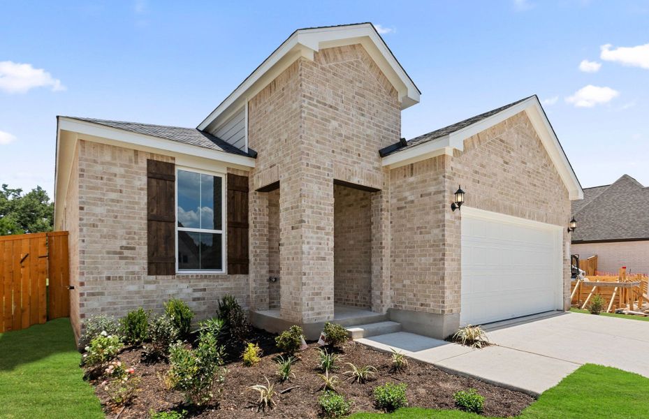 Front exterior of a new home in Woodside, Georgetown, TX, highlighting curb appeal (Image 20).