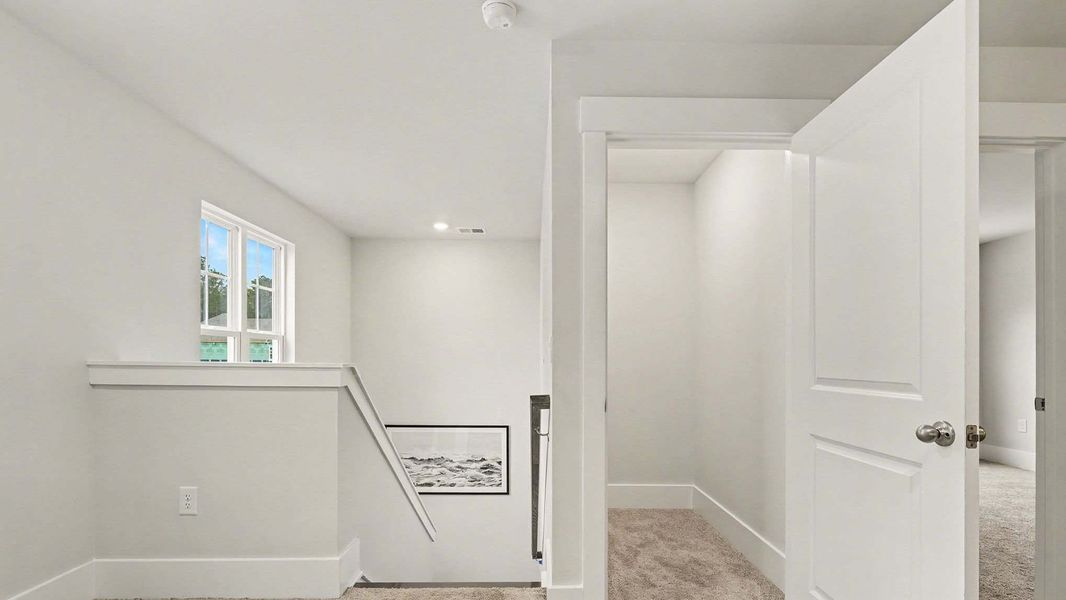 Spacious, unfurnished interior of a new home in Brunswick Plantation, Ash (Image 19).