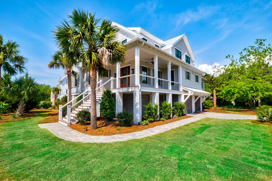 Front exterior of a new home in , Sullivan's Island, SC, highlighting curb appeal (Image 24).