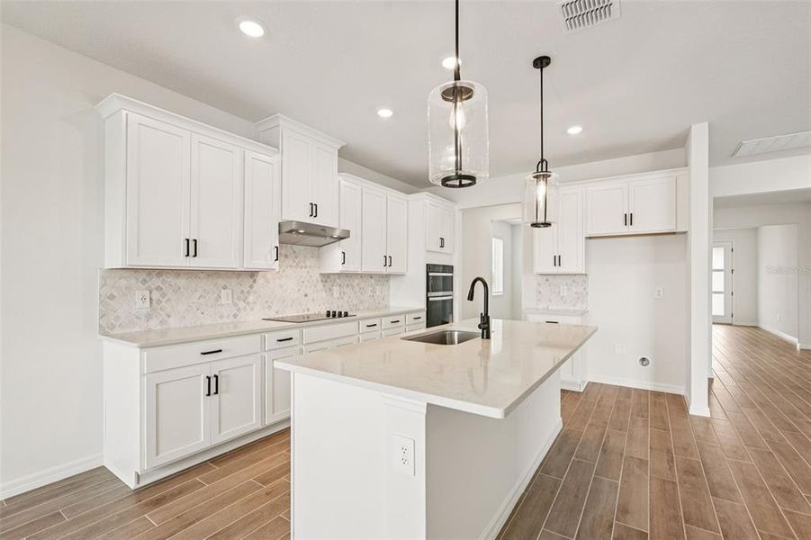 Furnished interior view inside a new home in Oakfield Trails - Signature Series, Parrish (Image 5).