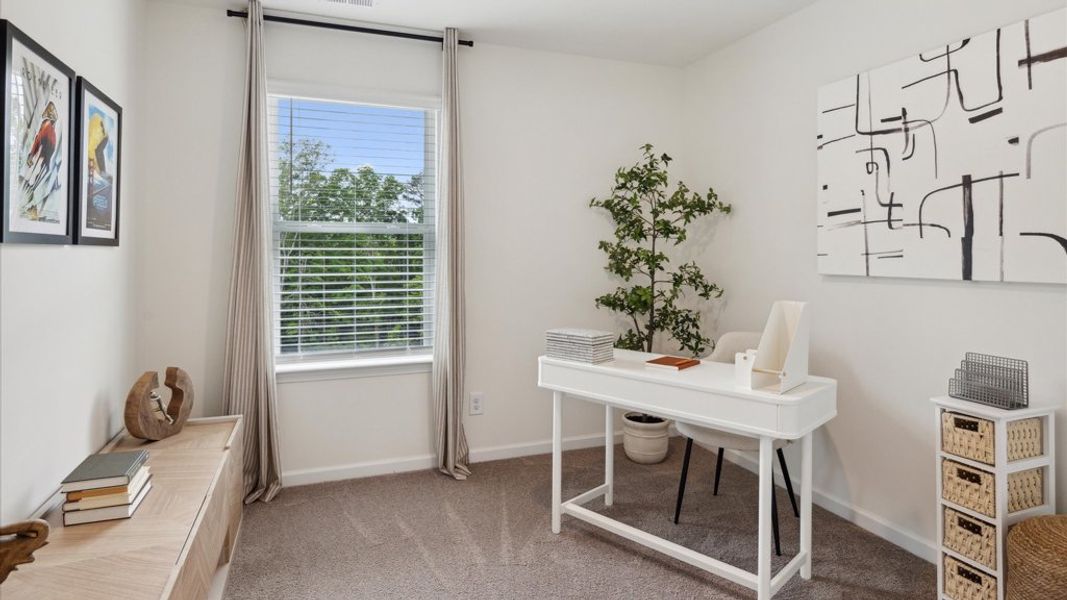 Representative furnished interior of a home built from the Altamont Townhome by D.R. Horton in Saint Marc's, Powell (Image 21).