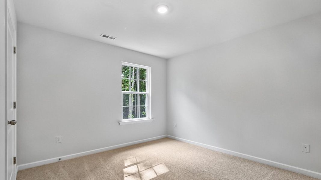 Spacious, unfurnished interior of a new home in Tyler - Home on the Lake, New Bern (Image 21).