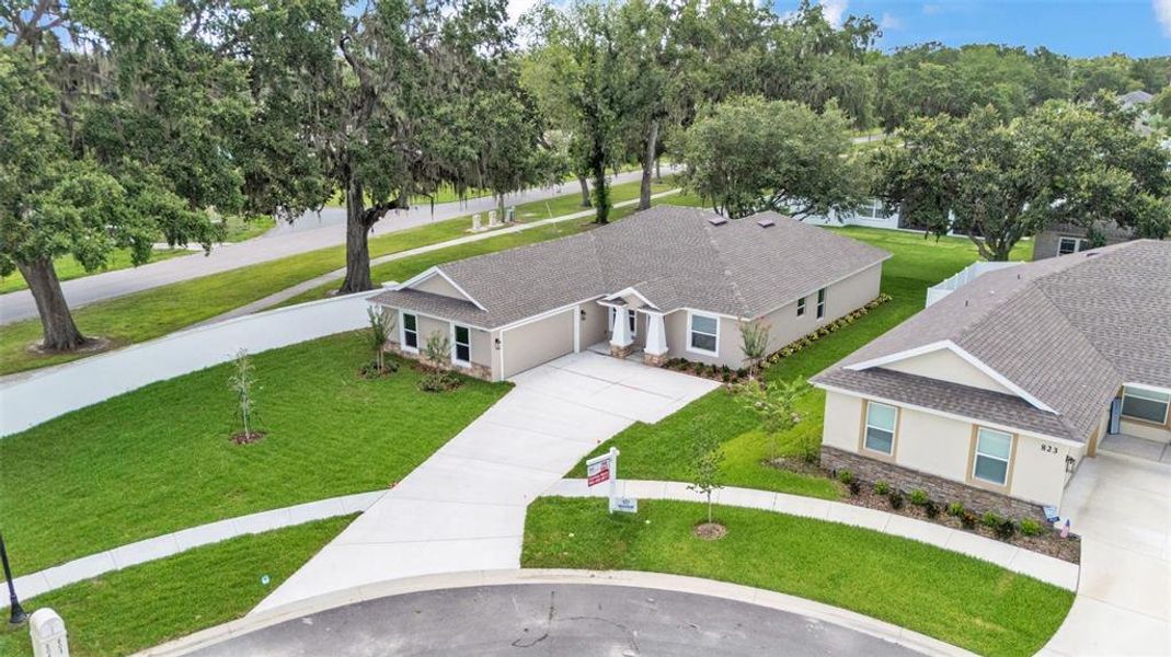 Front exterior of a new home in , Bartow, FL, highlighting curb appeal (Image 20).