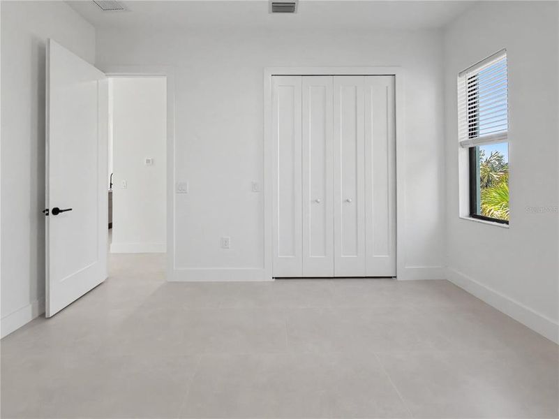 Spacious, unfurnished interior of a new home in , Port Charlotte (Image 34).