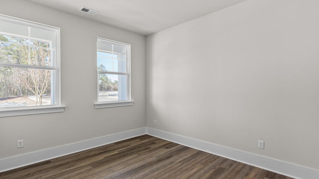 Spacious, unfurnished interior of a new home in Indigo Preserve, Leland (Image 29).