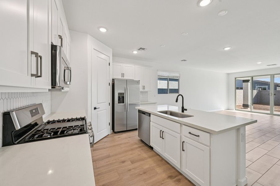 Kitchen featuring the Harmony Collection. Finishes and options may vary by community.