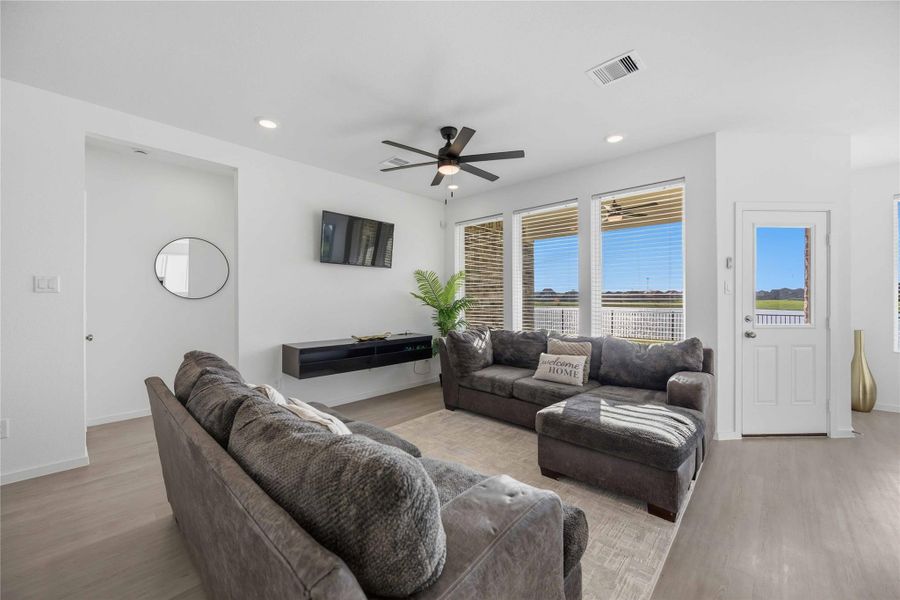 Living Area w/ Ceiling Fan / Open Concept / Views to the Lake Living Area w/ Ceiling Fan / Open Concept / Views to the Lake