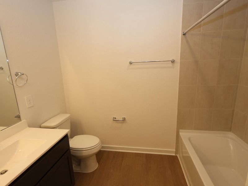 Furnished interior view inside a new home in Pinewood at Grand Texas, New Caney (Image 8).