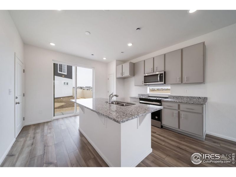 Furnished interior view inside a new home in Thompson River Ranch, Johnstown (Image 9).
