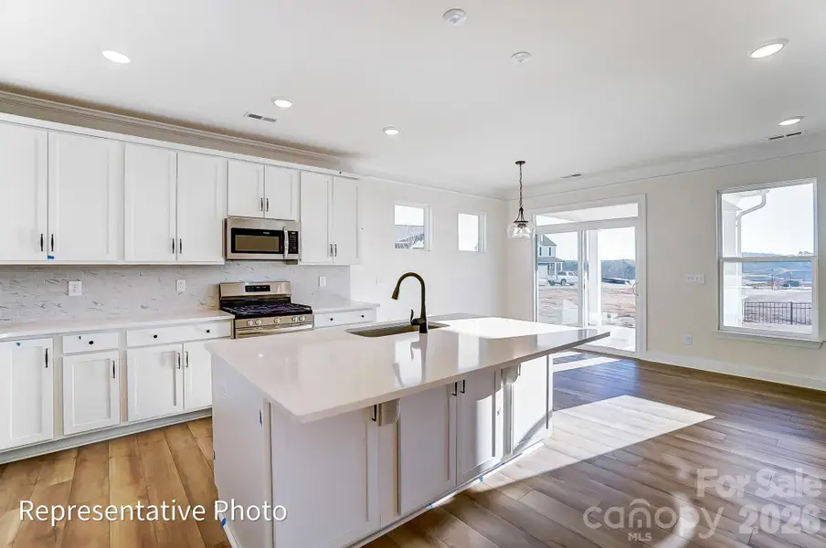 Furnished interior view inside a new home in Heritage - 55+ Community, Indian Trail (Image 5).