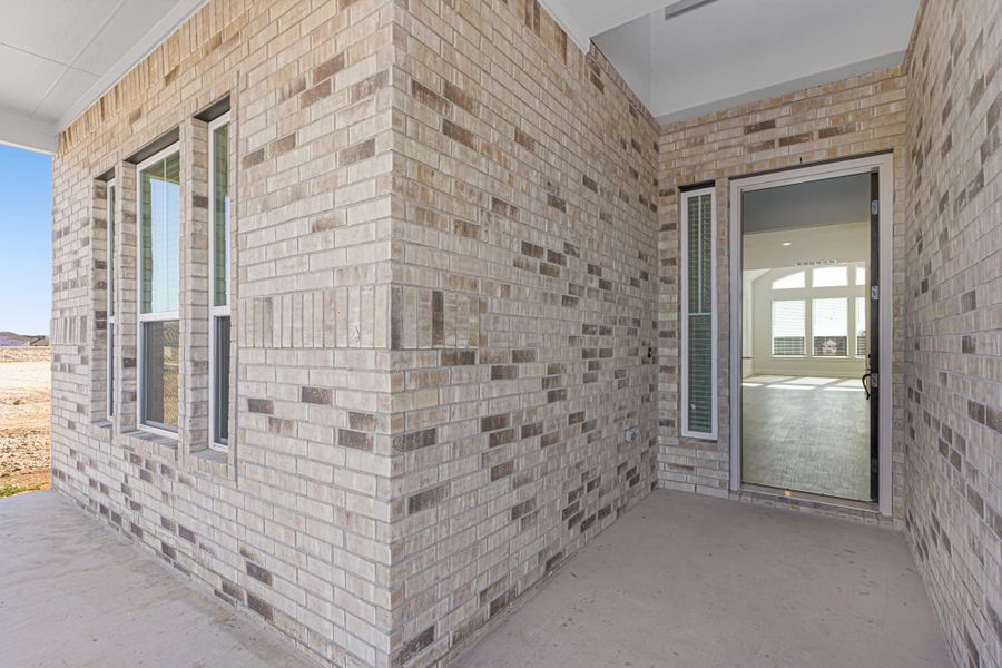 Exterior details and patio area of a home in Highland Village, Georgetown (Image 29).