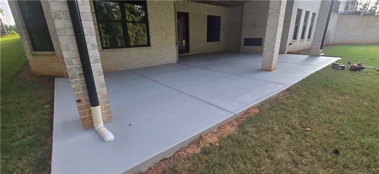 Exterior details and patio area of a home in , Milton (Image 36).