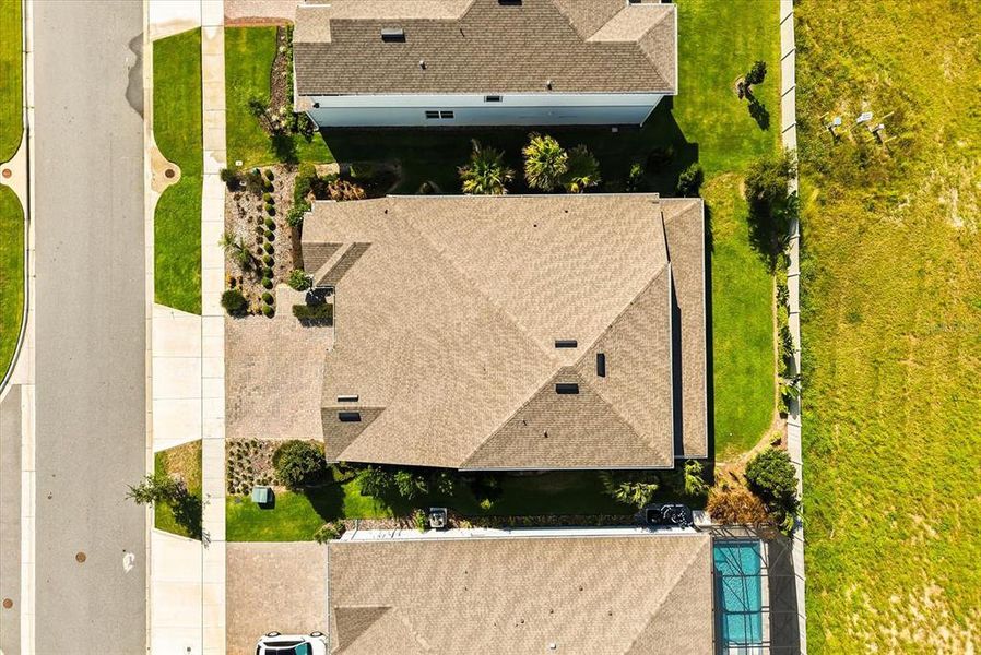 Front exterior of a new home in , Winter Garden, FL, highlighting curb appeal (Image 1).