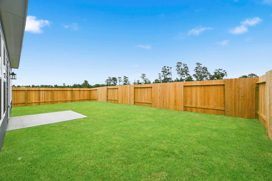 Exterior details and patio area of a home in Crockett Meadows, Conroe (Image 20).