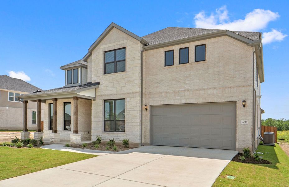 Representative exterior photo of a completed home built from the Ferris by Pulte Homes in Kuempel Estates, Pflugerville, TX (Image 25). Representative exterior photo of a completed home built from the Ferris by Pulte Homes in Kuempel Estates, Pflugerville, TX (Image 25).