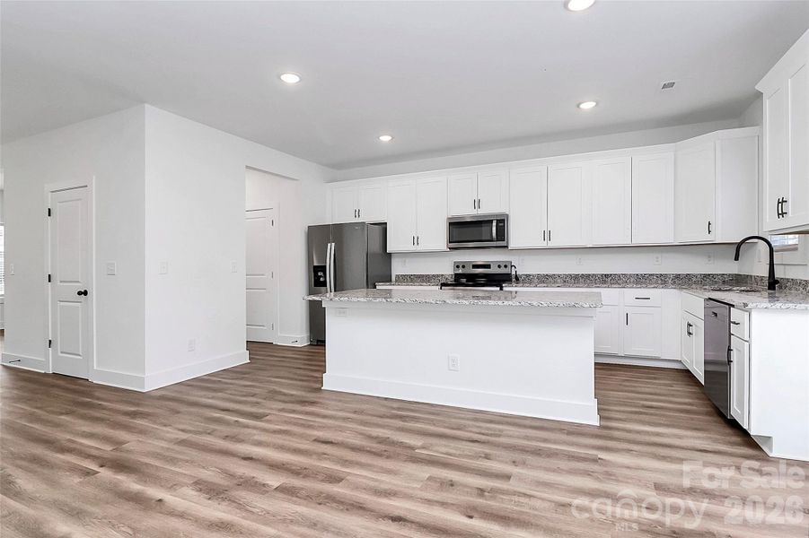 Furnished interior view inside a new home in , Monroe (Image 8).