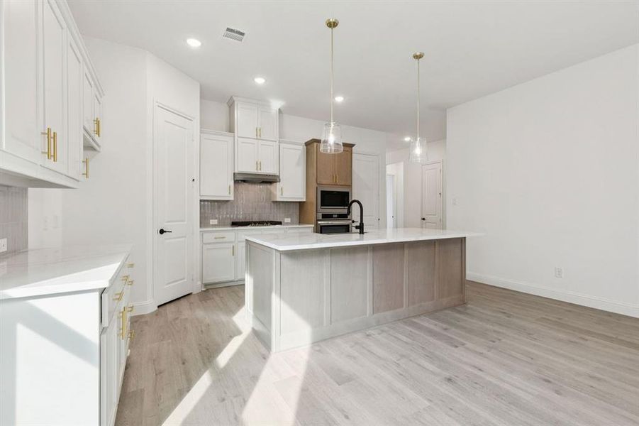 Furnished interior view inside a new home in Country Lakes, Denton (Image 6).