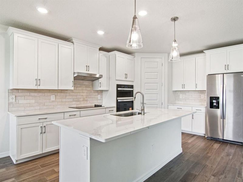 Furnished interior view inside a new home in Two Rivers - Signature Series, Zephyrhills (Image 6).