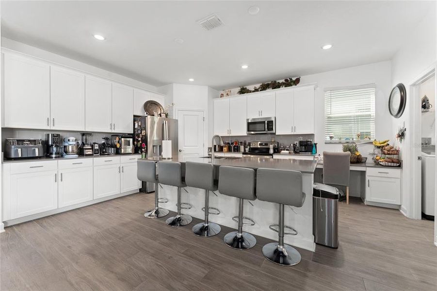 Furnished interior view inside a new home in Storey Park: Innovation Manor Collection, Orlando (Image 20).