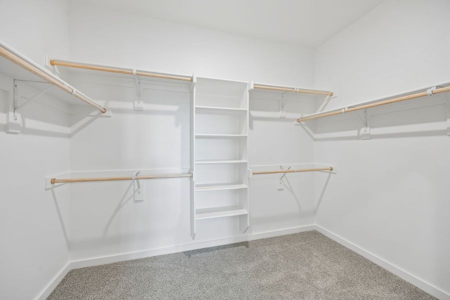Primary Closet in the Mesquite home plan by Trophy Signature Homes – REPRESENTATIVE PHOTO