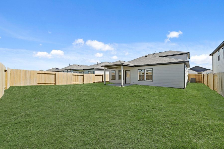 Exterior details and patio area of a home in Paloma at Sanford Farms, Waller (Image 4).