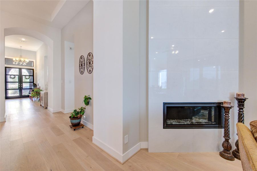 Floor-to-Ceiling Glazed Porcelain Gas Fireplace