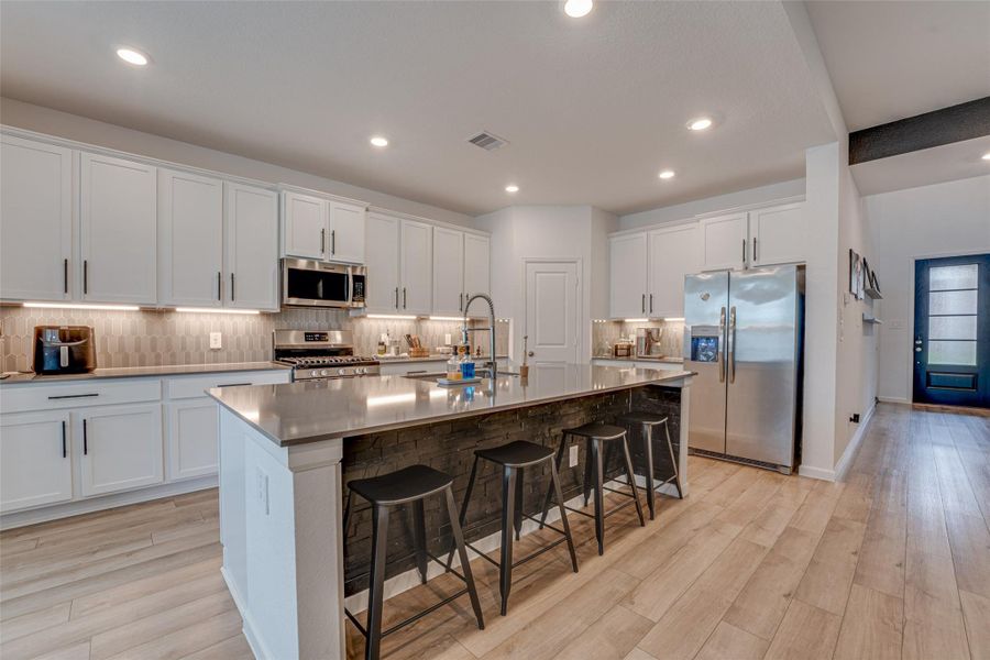 Furnished interior view inside a new home in ARTAVIA: Fairway Collection, Conroe (Image 16).