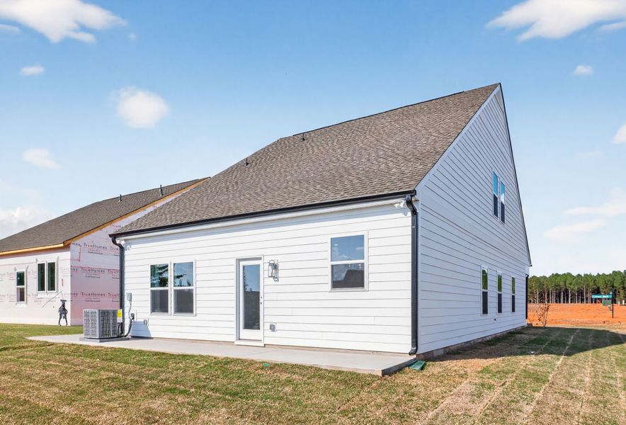 Exterior details and patio area of a home in Edgewater - Cottage Greens, Lancaster (Image 26).